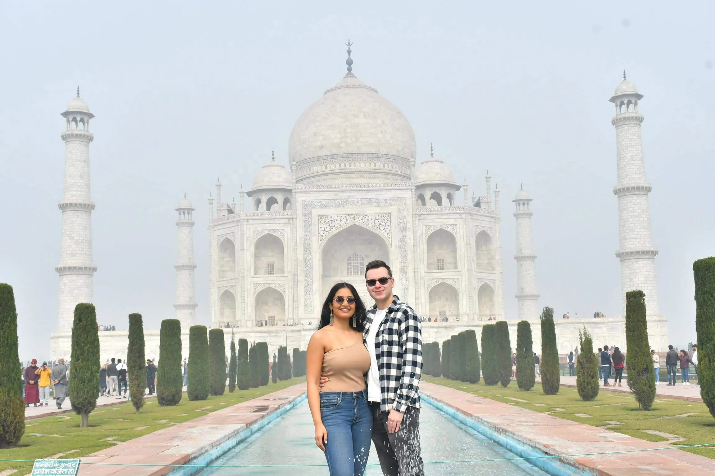 Homepage photo of travel blog. Standing in front of the Taj Mahal in India