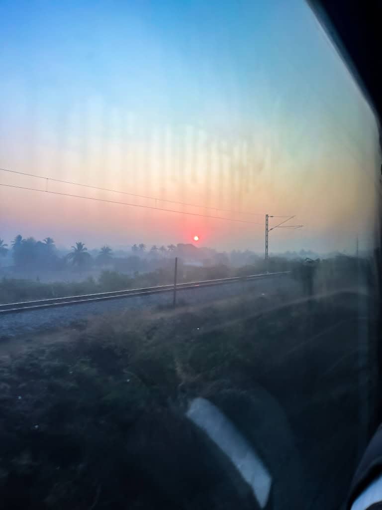 Sunrise from train window in India