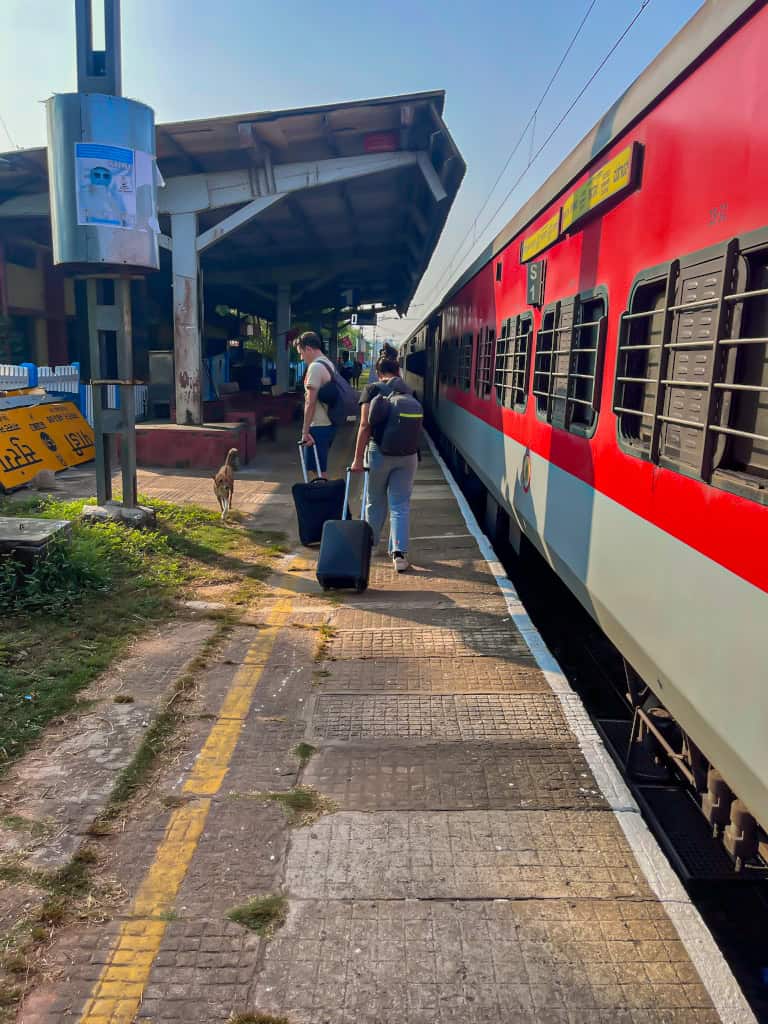 Indian train platform next to sleeper class