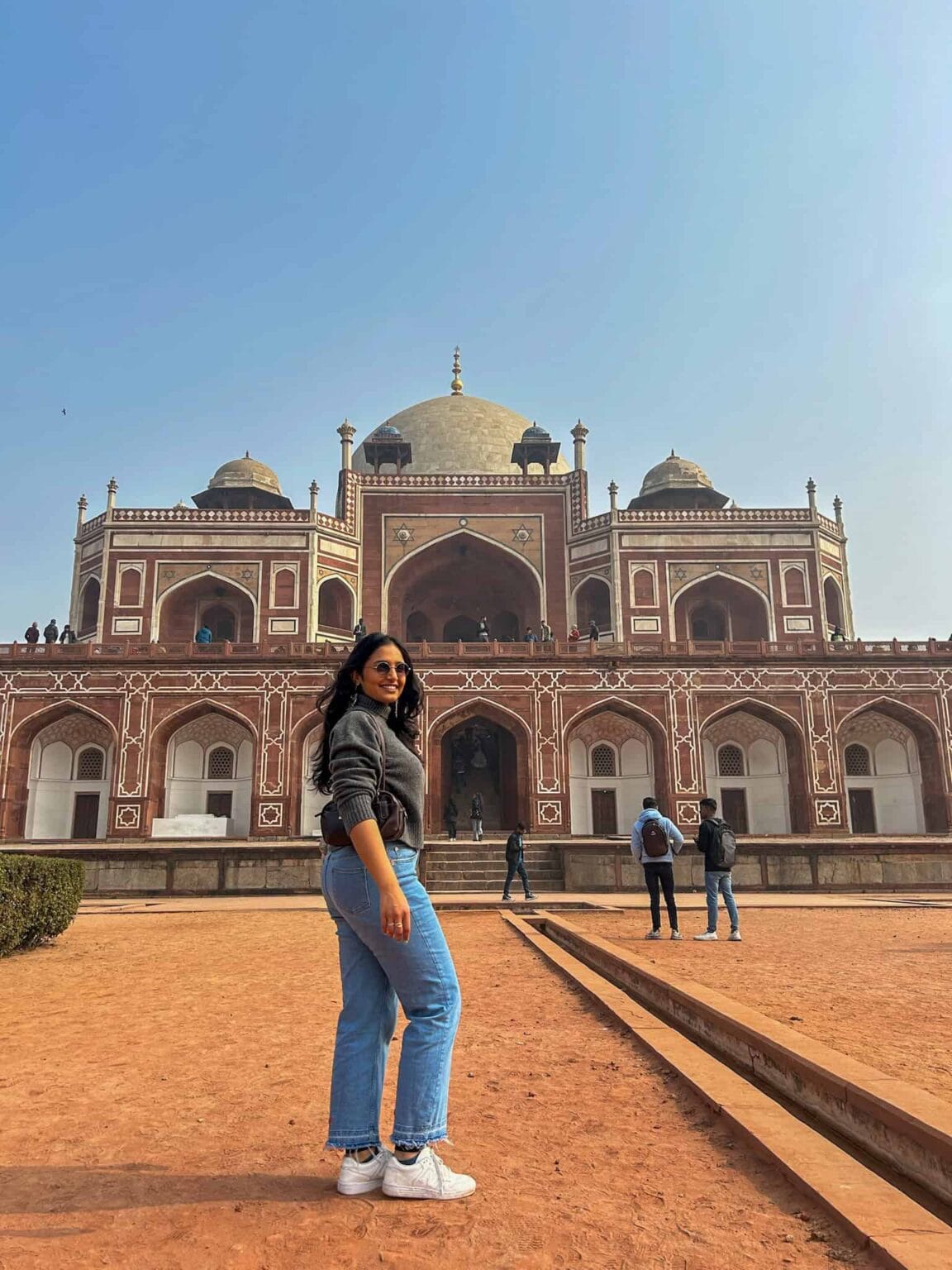 Poorva standing in front of Humayun's Tomb in Delhi